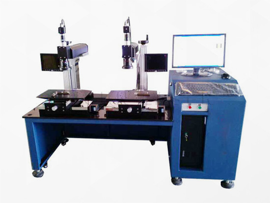 Double-head multi-station laser welding machine